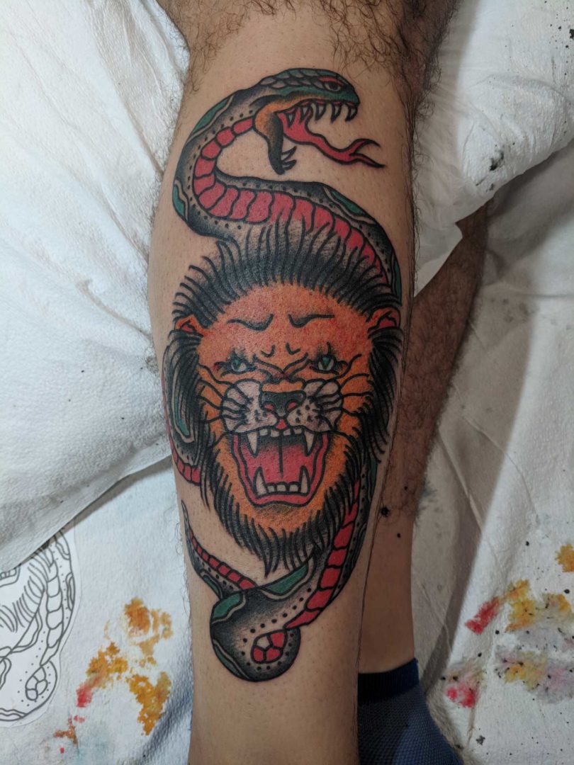 traditional roaring lion tattoo