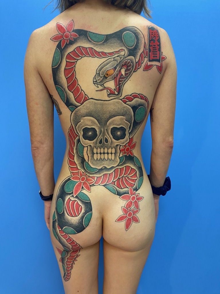 Awesome traditional Japanese back tattoo by @horininja. Swipe to the side  to see both photos! This tattoo is so bold and so classic! #ja